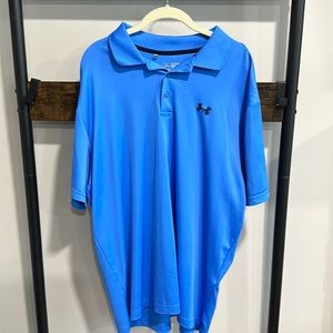 Under Armour heat gear polo in blue. Size XXL. In new like condition.